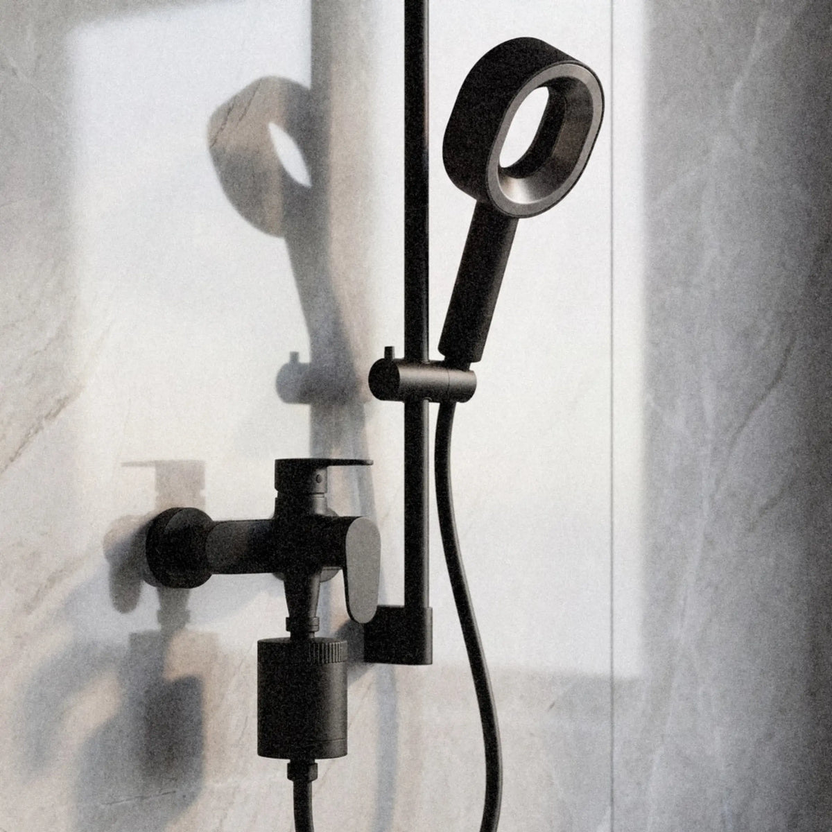 The two-stage system installed in a real shower